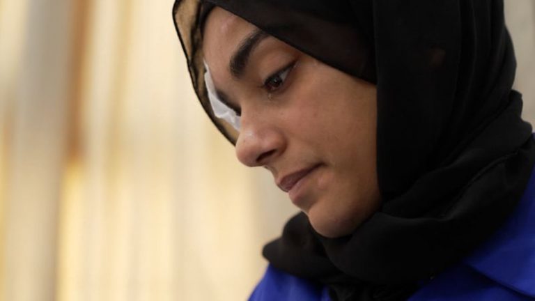 She managed to flee Gaza after half her family was killed in an Israeli strike. She blames Israel and Hamas for what happened